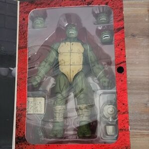 Teenage Mutant Ninja Turtles: The Last Ronin – Battle Damaged Figure by NECA NIB